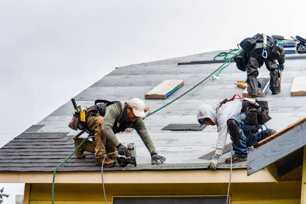 Professional Flat Roof Repair technician working in West Kennebunk, ME